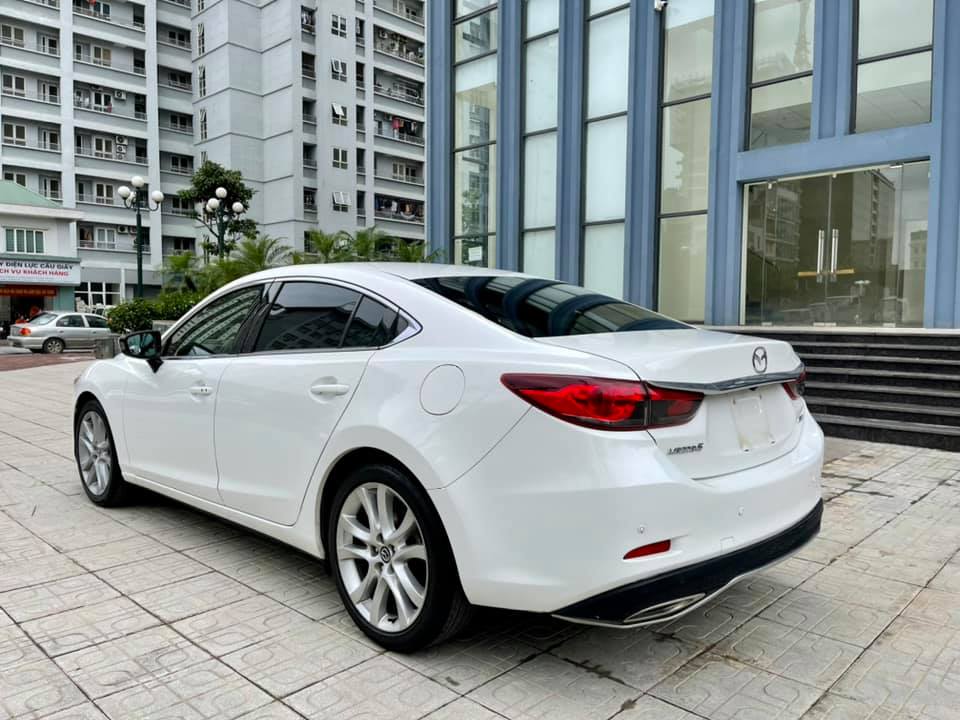 Bán xe Mazda 6 20 AT 2016 màu trắng đắp mền chạy siêu ít 6900 km